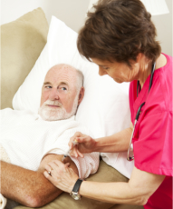 nurse taking care of her patient